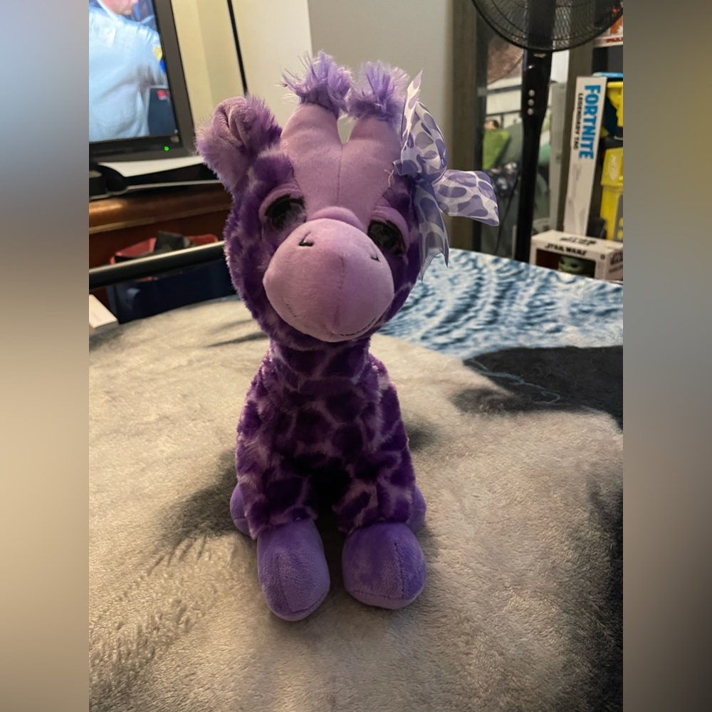 Purple giraffe stuffed animal